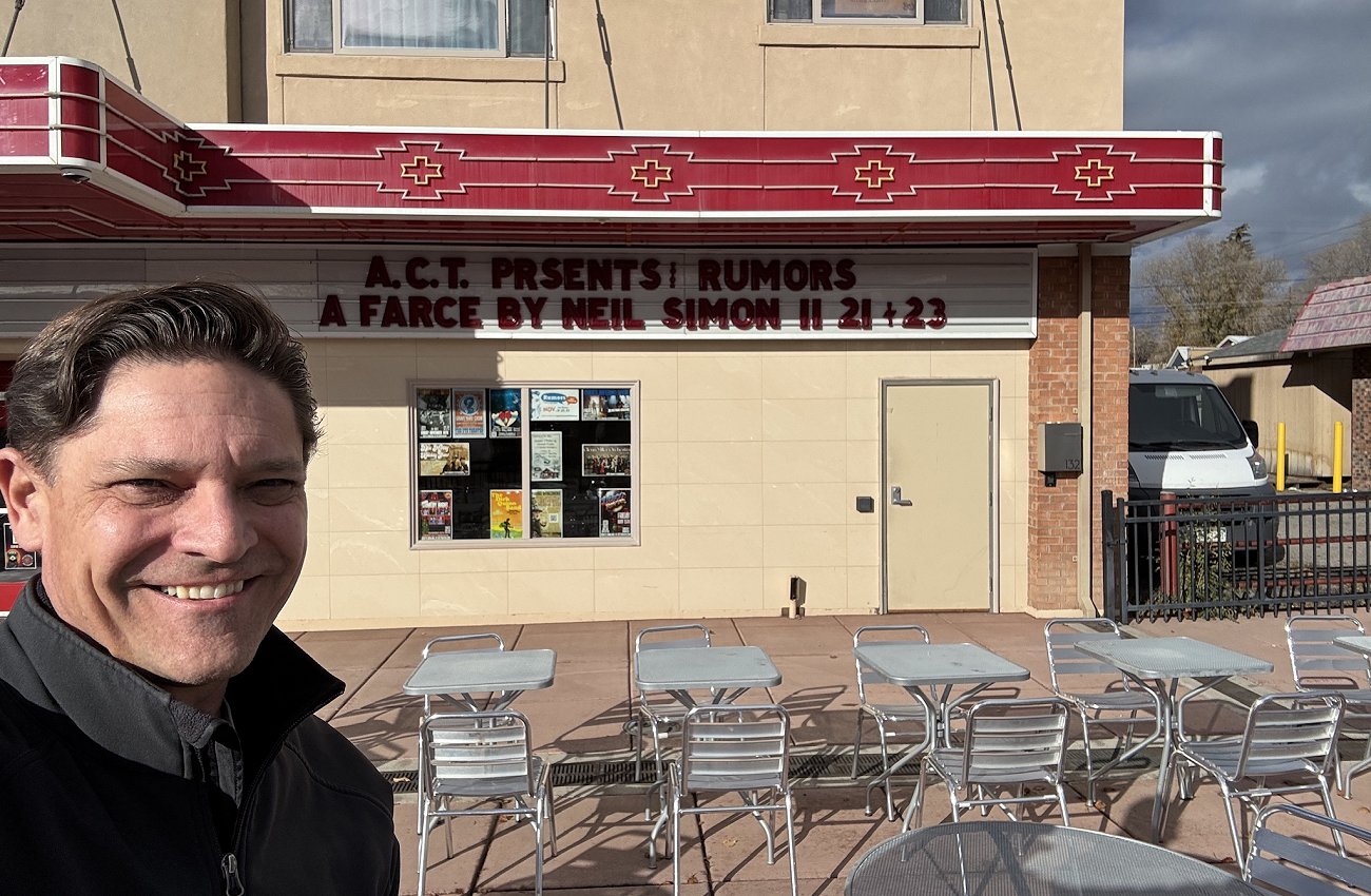 Mircea Oprea standing in front of Ute Theater and Events Center in Rifle CO a few days before his performance in Neil Simon's Rumors as Lenny Ganz